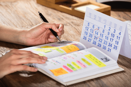 photo of a planner and a calendar